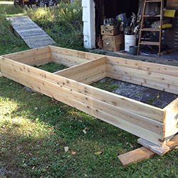 new cedar raised bed under construction