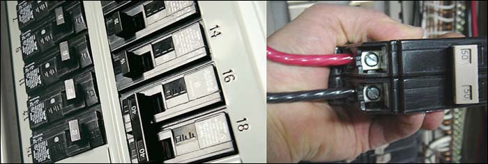 panel box with 120 V and 240 V circuit breakers