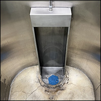 stainless steel urinal in Milstein Hall