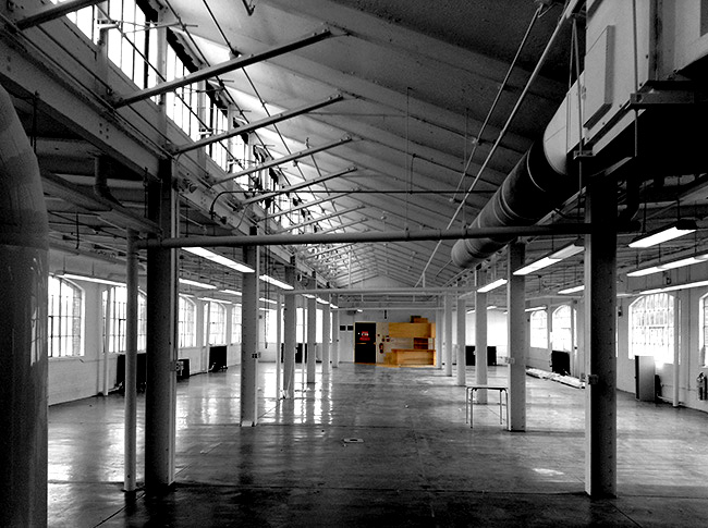 View of Rand Hall interior showing top floor with skylight.