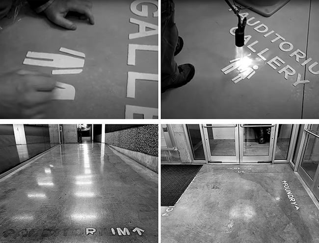 Installation of and damage to floor-mounted signs in Milstein Hall.